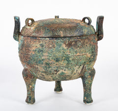 A Chinese Archaic Ding Style Bronze Covered Vessel