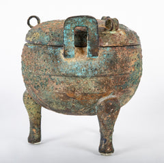 A Chinese Archaic Ding Style Bronze Covered Vessel