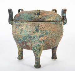 A Chinese Archaic Ding Style Bronze Covered Vessel