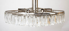 Clear Prism Chandelier with Nickel Plated Concentric Circles as Frame