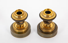 A Pair of French Empire Gilt and Bronze Candlesticks