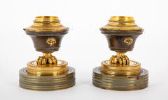 A Pair of French Empire Gilt and Bronze Candlesticks