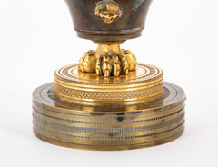 A Pair of French Empire Gilt and Bronze Candlesticks