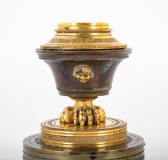 A Pair of French Empire Gilt and Bronze Candlesticks