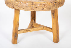 A 19th Century Wooden Mill Wheel as a Low Side Table