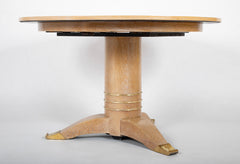 A Jules Leleu Bleached Oak Dining Table with Two Extension Leaves