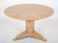 A Jules Leleu Bleached Oak Dining Table with Two Extension Leaves