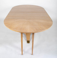 A Jules Leleu Bleached Oak Dining Table with Two Extension Leaves