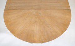 A Jules Leleu Bleached Oak Dining Table with Two Extension Leaves