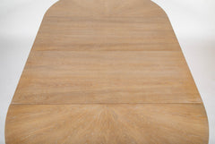 A Jules Leleu Bleached Oak Dining Table with Two Extension Leaves