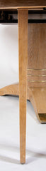 A Jules Leleu Bleached Oak Dining Table with Two Extension Leaves