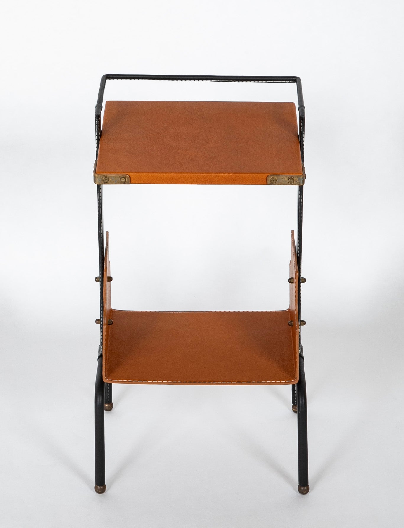 A Jacques Adnet Black and Cognac Leather over Metal Frame Table