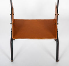 A Jacques Adnet Black and Cognac Leather over Metal Frame Table