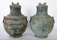 A Pair of Chinese "Warring States" Period Bronze Lidded Wine Vessels
