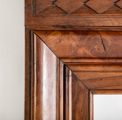 A Large 19th Century Neoclassical Carved Walnut Mirror
