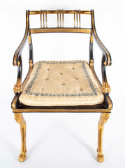 A Pair of Regency Style Ebonized and Parcel Gilt Armchairs