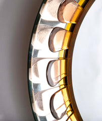 A Round Mirror with Painted Metal Petal Decor by Max Ingrand