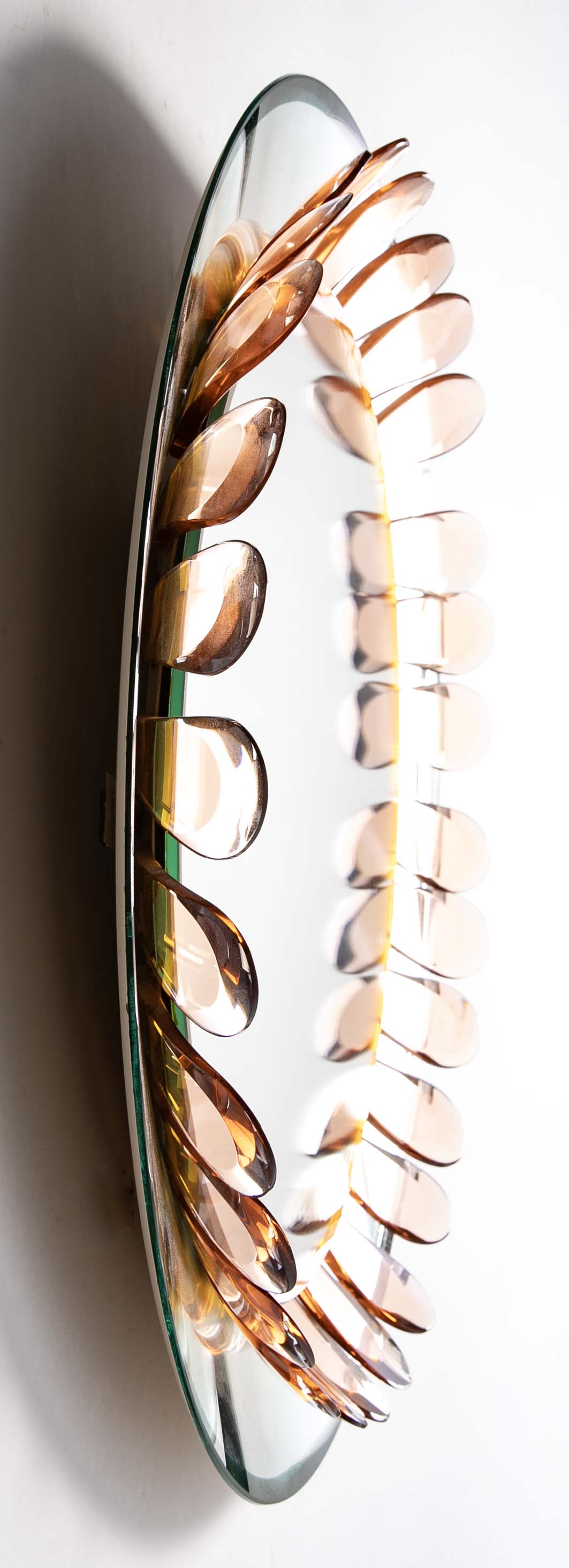 A Round Mirror with Painted Metal Petal Decor by Max Ingrand