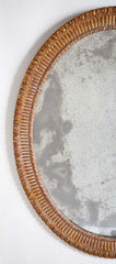 A George III Style Carved Giltwood Oval Mirror