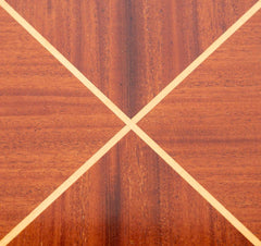 A Tommi Parzinger for Charak Modern Mahogany and Maple Dining Table with Leaves.
