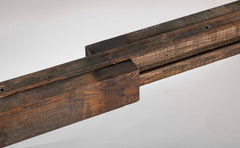 A Tommi Parzinger for Charak Modern Mahogany and Maple Dining Table with Leaves.