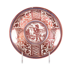 Ruby Lustre Ware Plate with Man Carrying Bird on a Stick