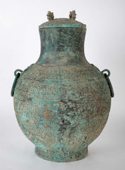 A Pair of Chinese "Warring States" Period Bronze Lidded Wine Vessels