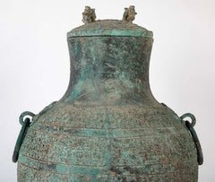 A Pair of Chinese "Warring States" Period Bronze Lidded Wine Vessels