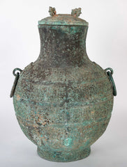 A Pair of Chinese "Warring States" Period Bronze Lidded Wine Vessels