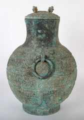 A Pair of Chinese "Warring States" Period Bronze Lidded Wine Vessels