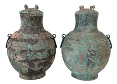 A Pair of Chinese "Warring States" Period Bronze Lidded Wine Vessels