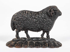 Near Pair of 19th Century English Cast Iron Sheep Form Door Stops