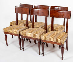 A Rare Set of 12 Restauration / Empire Dining Chairs of Classic Design