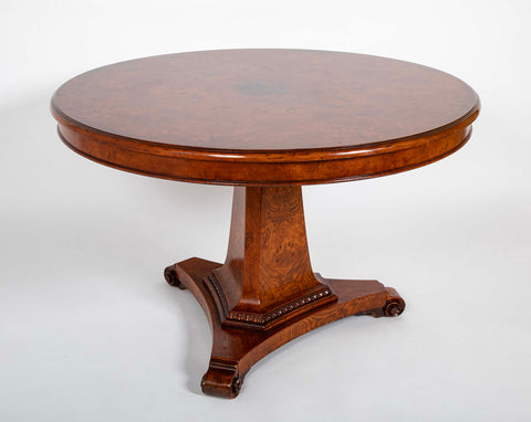 An English Late Regency Burl Walnut Tripartite Pedestal Center Table