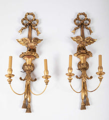 A Pair of Carved and Gilded Two Light Eagle Wall Sconces