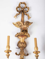 A Pair of Carved and Gilded Two Light Eagle Wall Sconces