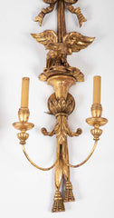 A Pair of Carved and Gilded Two Light Eagle Wall Sconces
