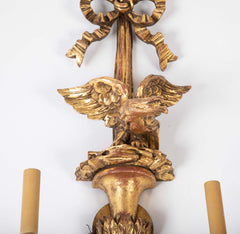 A Pair of Carved and Gilded Two Light Eagle Wall Sconces