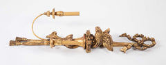 A Pair of Carved and Gilded Two Light Eagle Wall Sconces