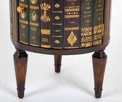 Cylinder Form Leather Faced Side Table with Faux Book Bindings on Drawers and Doors