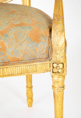 A Pair of George III Period Giltwood Oval Back "Elbow" Chairs