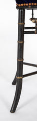 An Arts & Crafts Faux Ebonized Stool