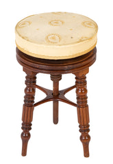 A Regency Reeded Leg Mahogany Revolving Stool