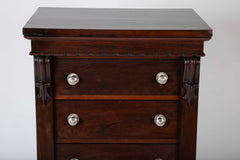 A 19th Century Brazilian Rosewood Six Drawer Wellington High Cabinet