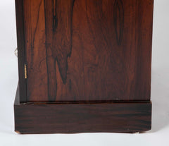 A 19th Century Brazilian Rosewood Six Drawer Wellington High Cabinet