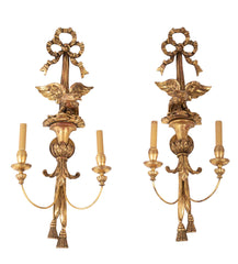 A Pair of Carved and Gilded Two Light Eagle Wall Sconces