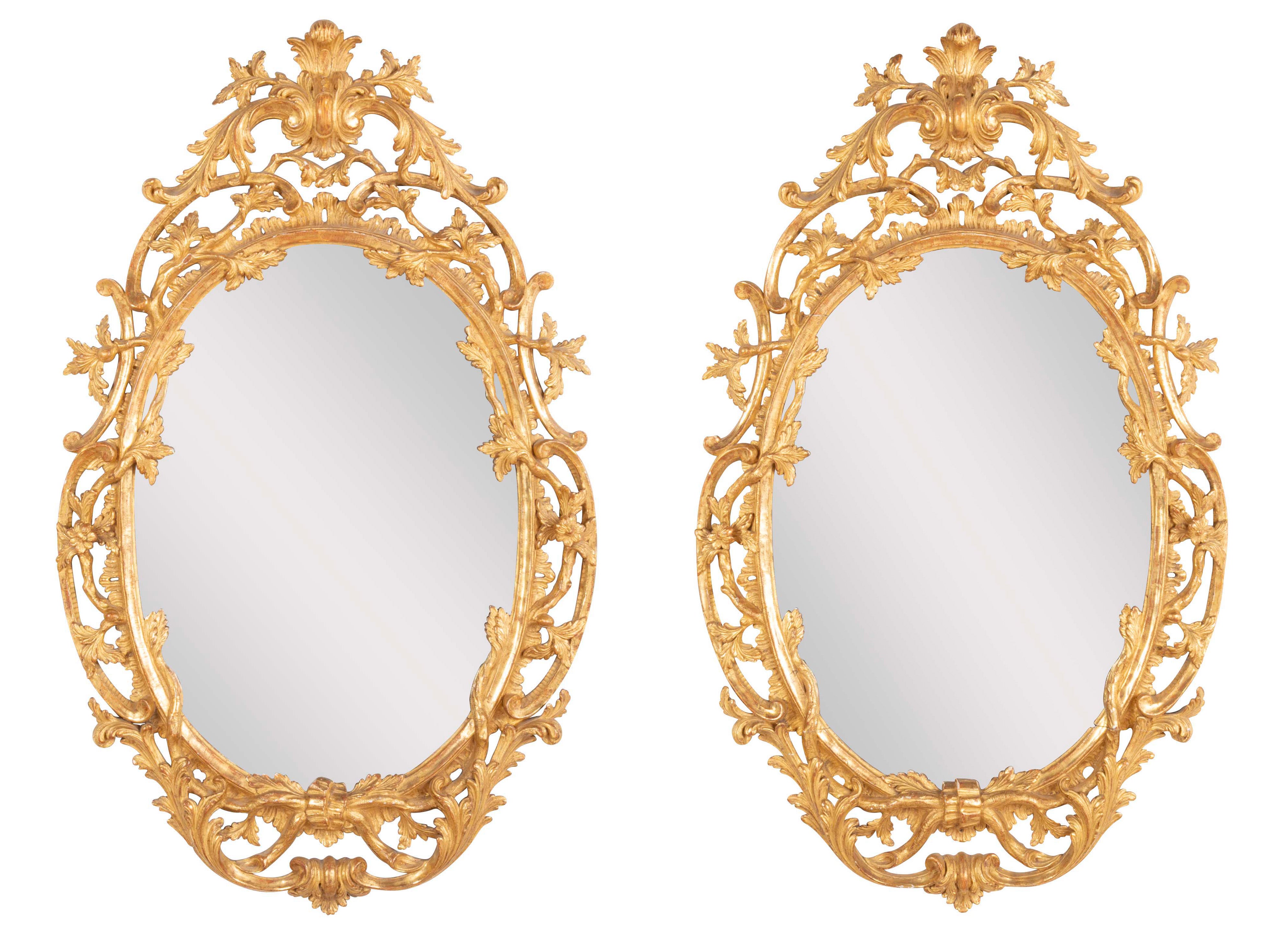 Pair of English George II Period Oval Gilt Mirrors