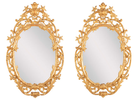 Pair of English George II Period Oval Gilt Mirrors