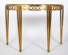 Striking Pair of Bronze Consoles with Fossilized Marble Tops