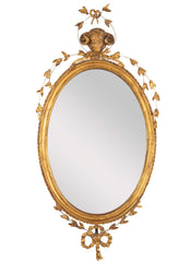 English George III Oval Hepplewhite Gilded Mirror with Ram's Head Surmount